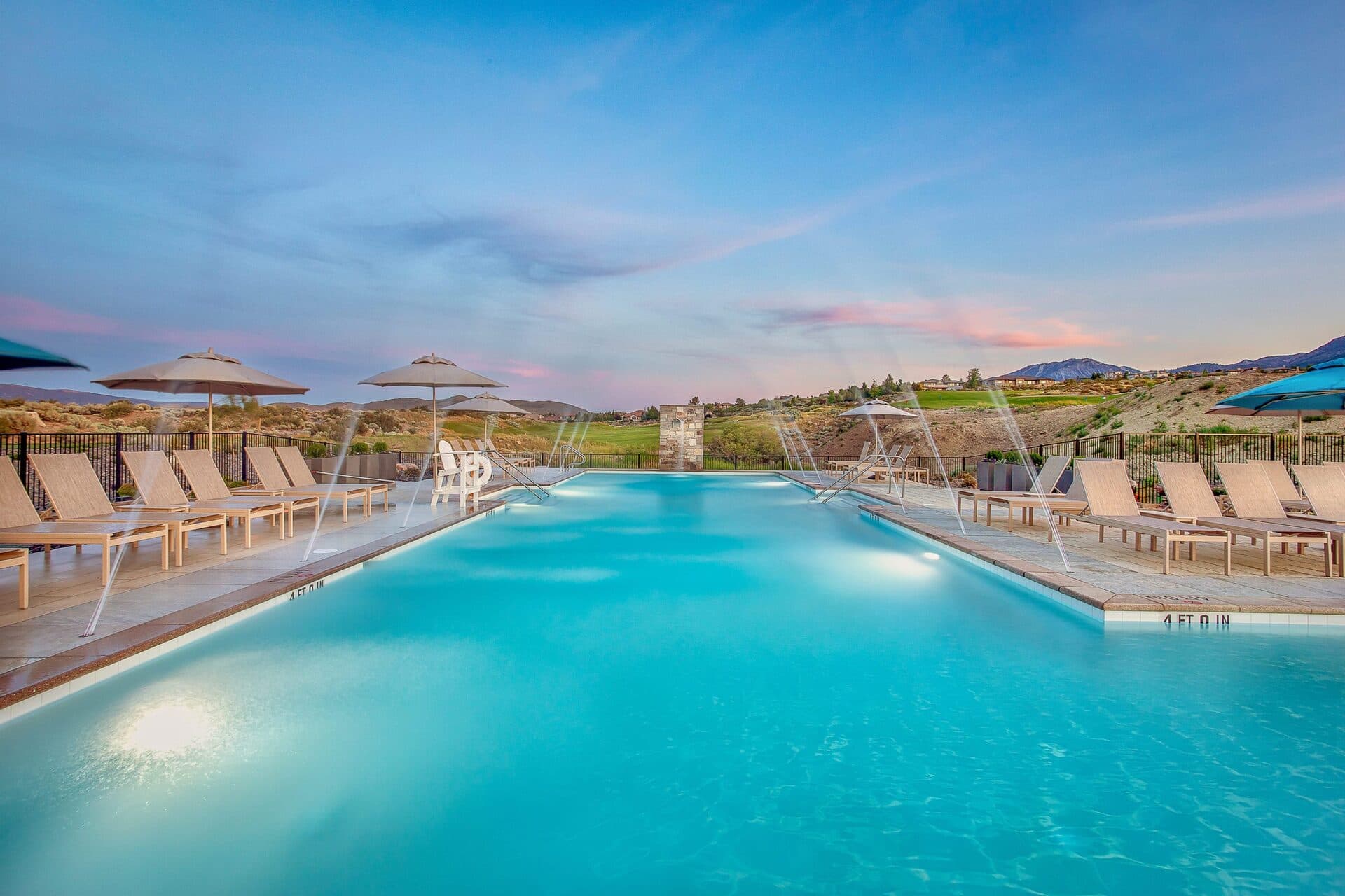 Resort-style pool at The Club at ArrowCreek at sunset Resort-style pool at The Club at ArrowCreek at sunset