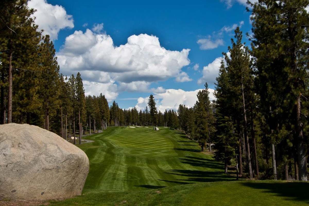 Granite boulder marker on Coyote Moon Golf Course fairway Granite boulder marker on Coyote Moon Golf Course fairway