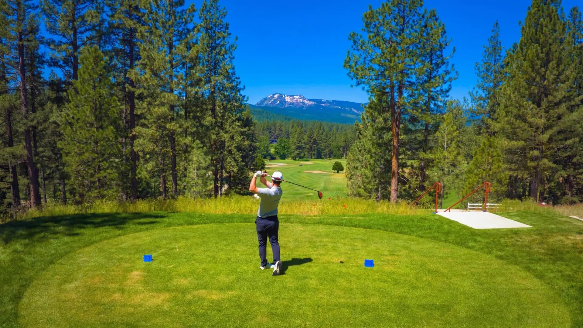 Tee shot at Graeagle Meadows with Sierra Nevada mountain view Tee shot at Graeagle Meadows with Sierra Nevada mountain view