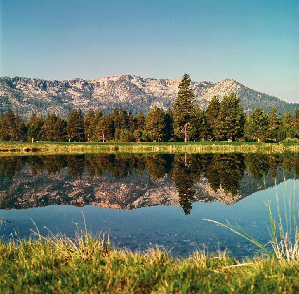 Pond with Sierra Nevada mountain reflection at Lake Tahoe Golf Course Pond with Sierra Nevada mountain reflection at Lake Tahoe Golf Course