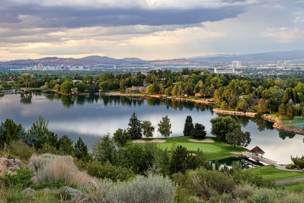 LakeRidge Golf Course aerial view showing island green, lake, and surrounding Reno neighborhoods LakeRidge Golf Course aerial view showing island green, lake, and surrounding Reno neighborhoods