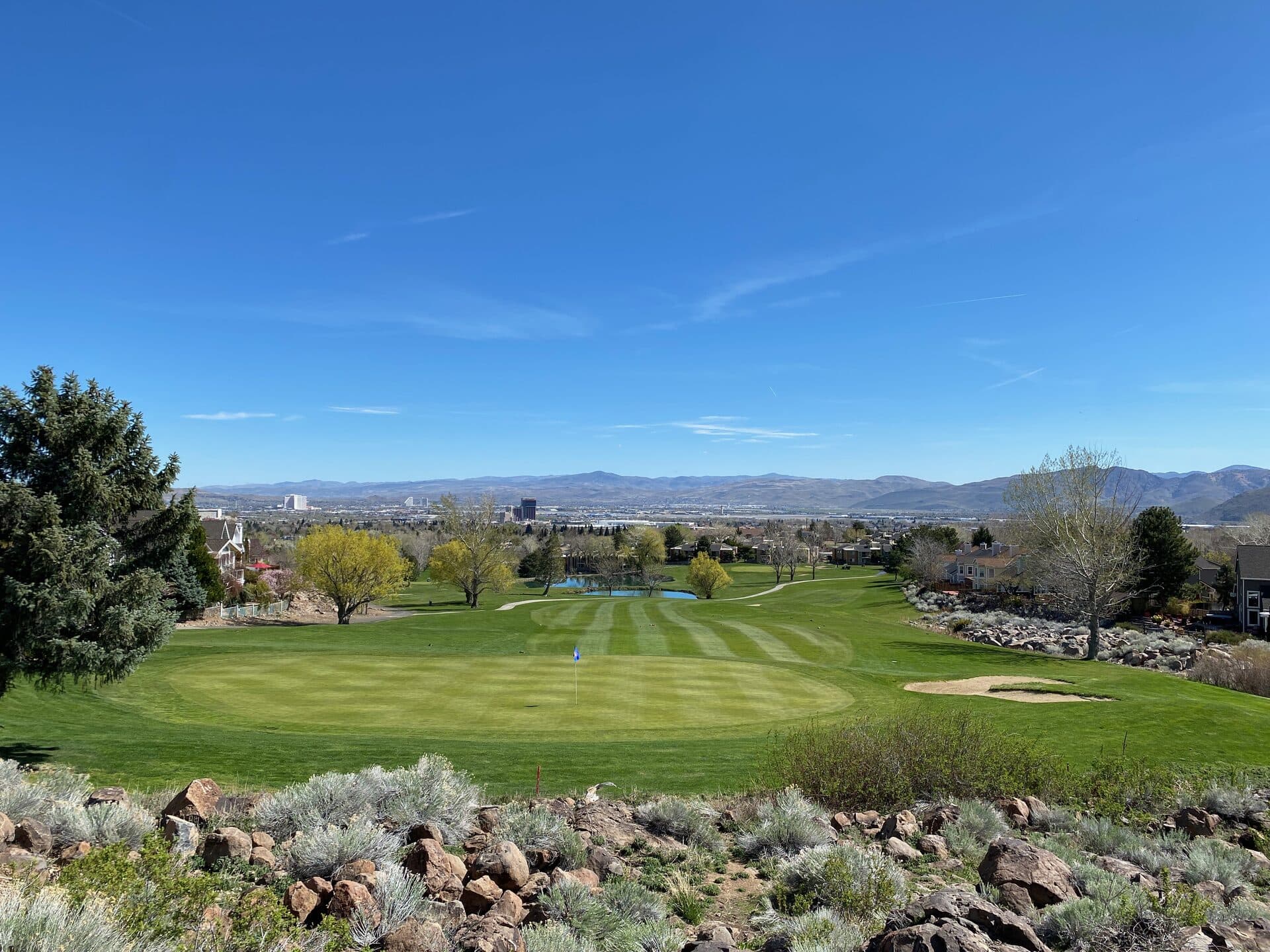 LakeRidge Golf Course fairway and green with Sierra Nevada mountain views LakeRidge Golf Course fairway and green with Sierra Nevada mountain views