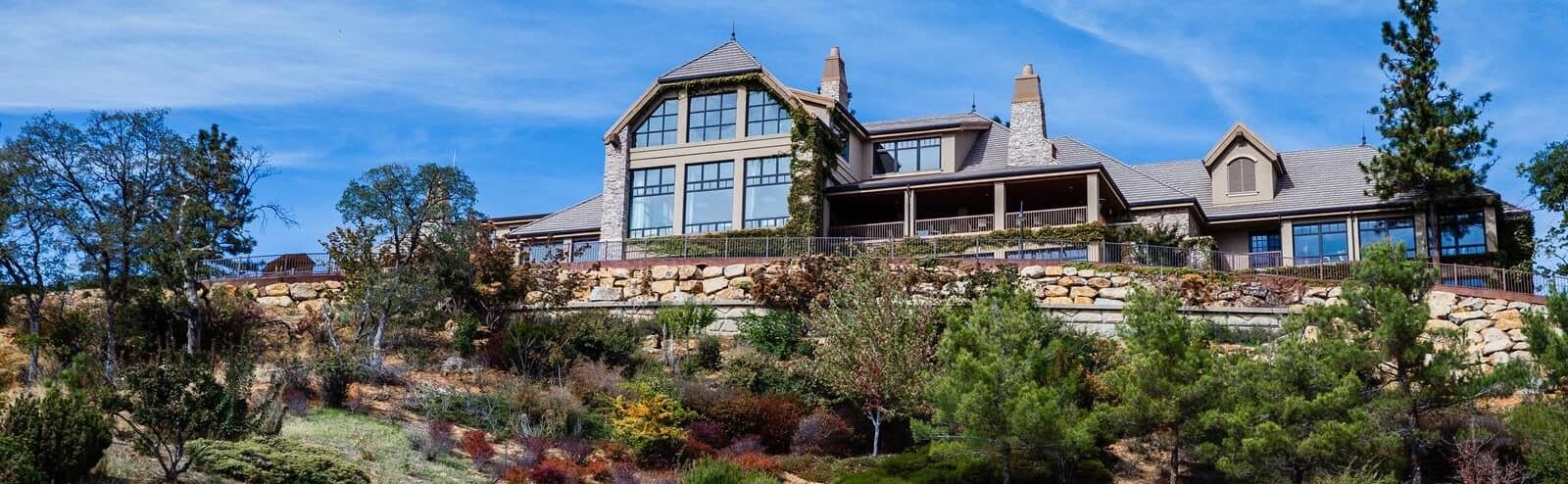 Winchester Country Club clubhouse with garden landscape Winchester Country Club clubhouse with garden landscape