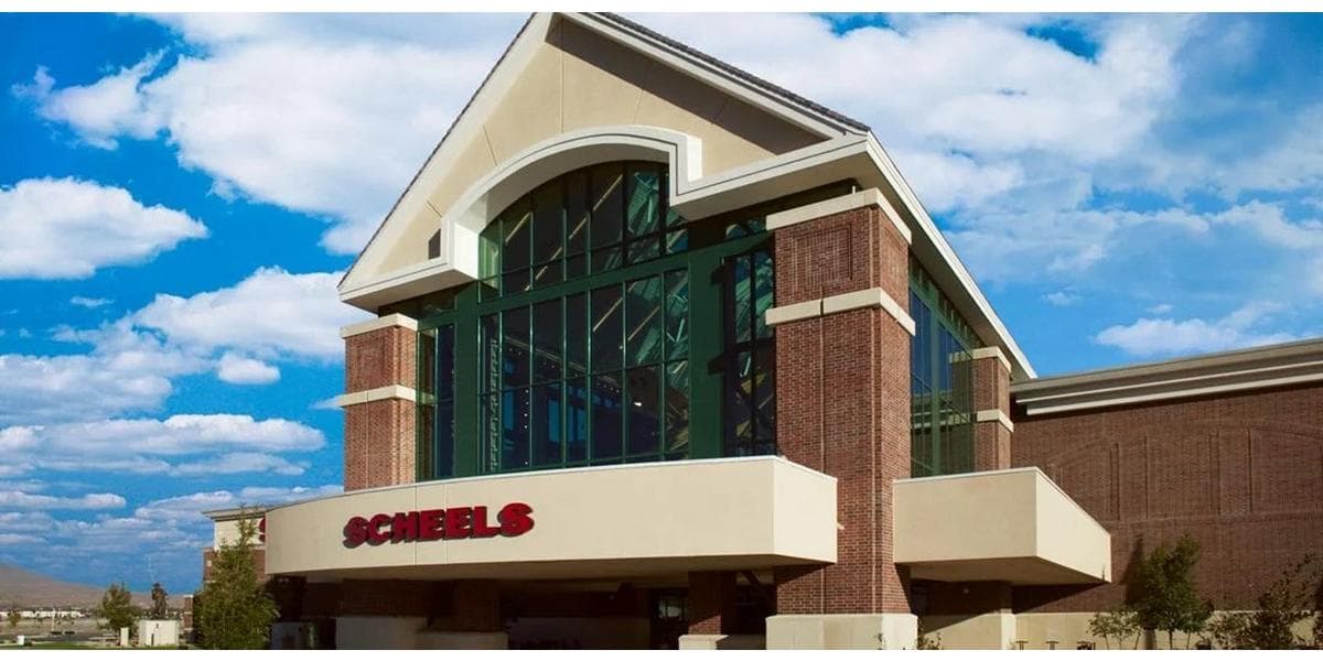 SCHEELS Sparks exterior with shopping center and Sierra backdrop