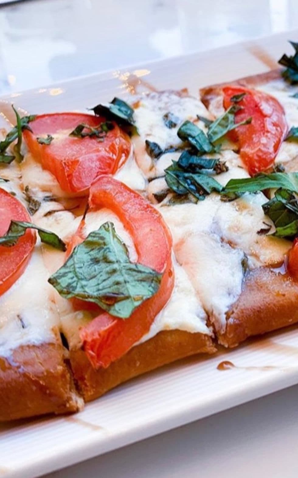 The Emerson Reno bar counter with back-bar bottle display