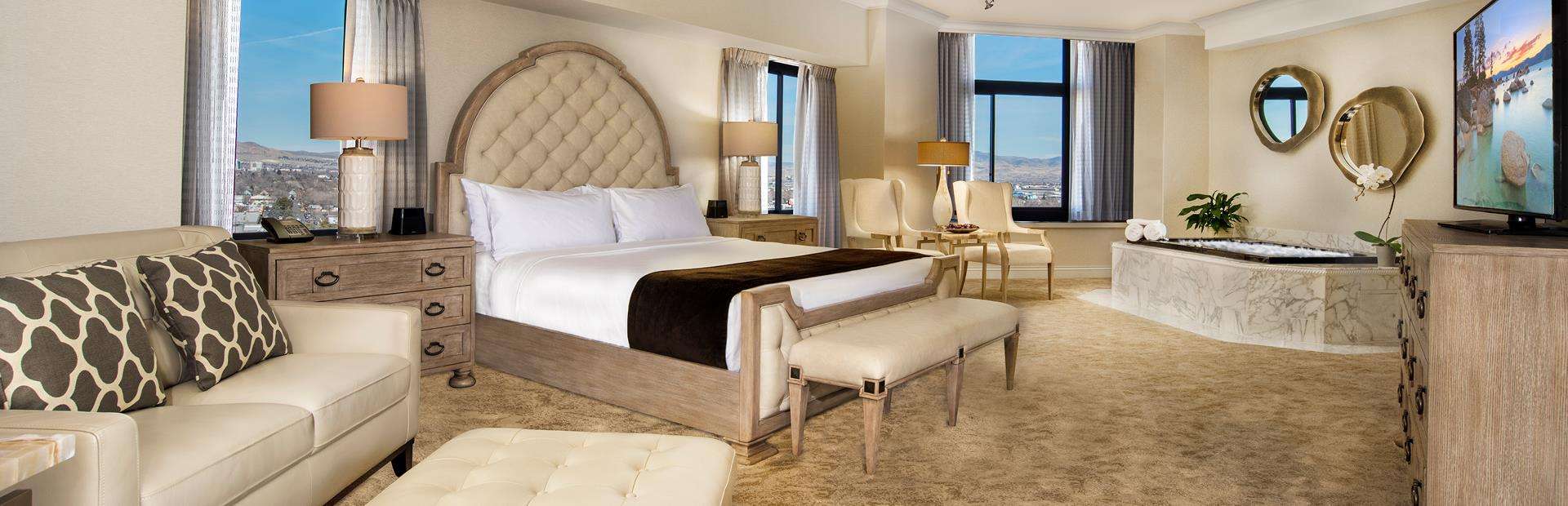 Atlantis Luxury Tower Room at Atlantis Casino Resort Spa — guest room with upscale furnishings and contemporary decor Atlantis Luxury Tower Room at Atlantis Casino Resort Spa — guest room with upscale furnishings and contemporary decor