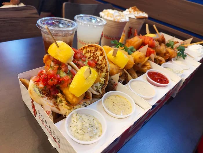 Gordon Ramsay Fish & Chips at Silver Legacy Resort Casino — bar and lounge seating