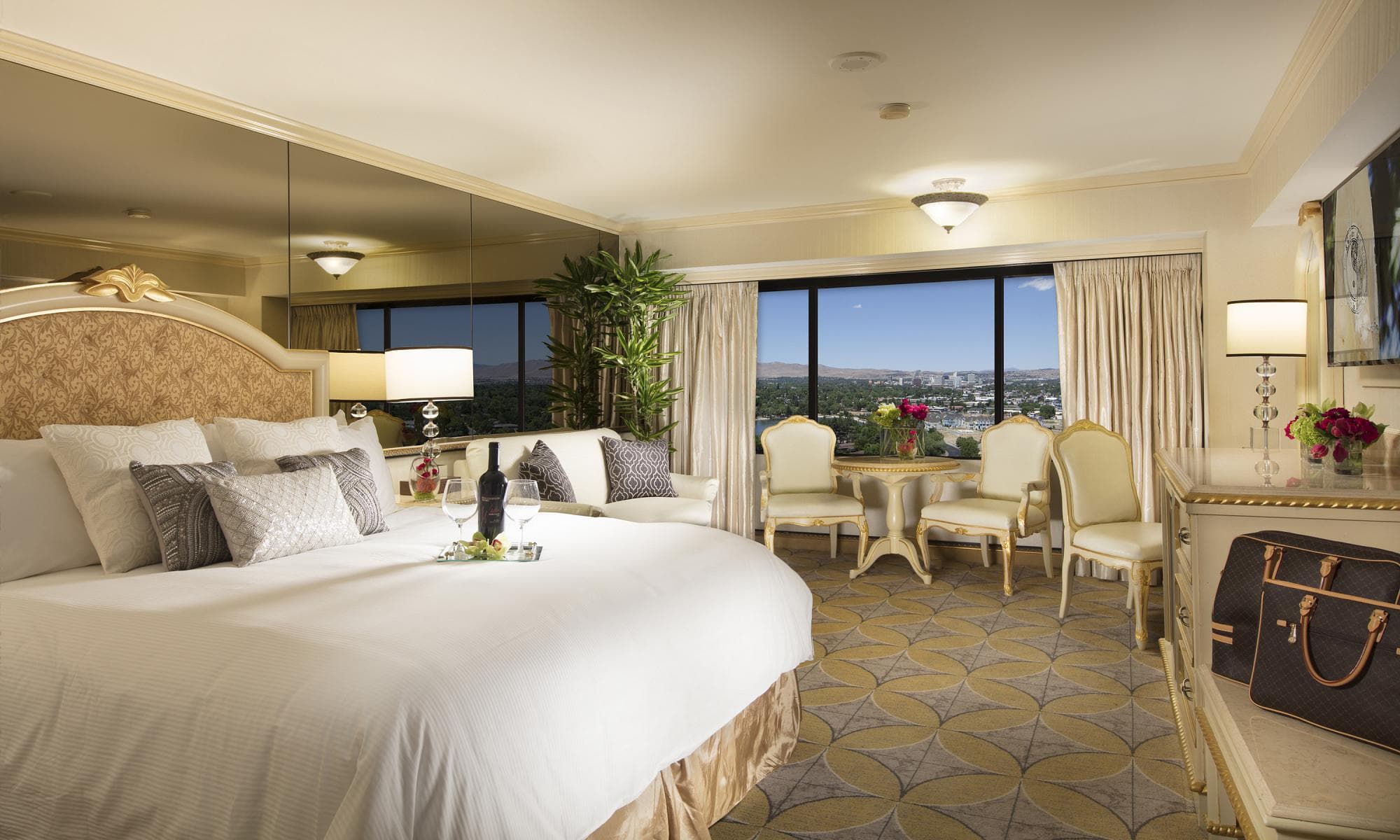 Peppermill Deluxe Remodeled King Room at Peppermill Resort Spa Casino — guest room with upscale furnishings and contemporary decor