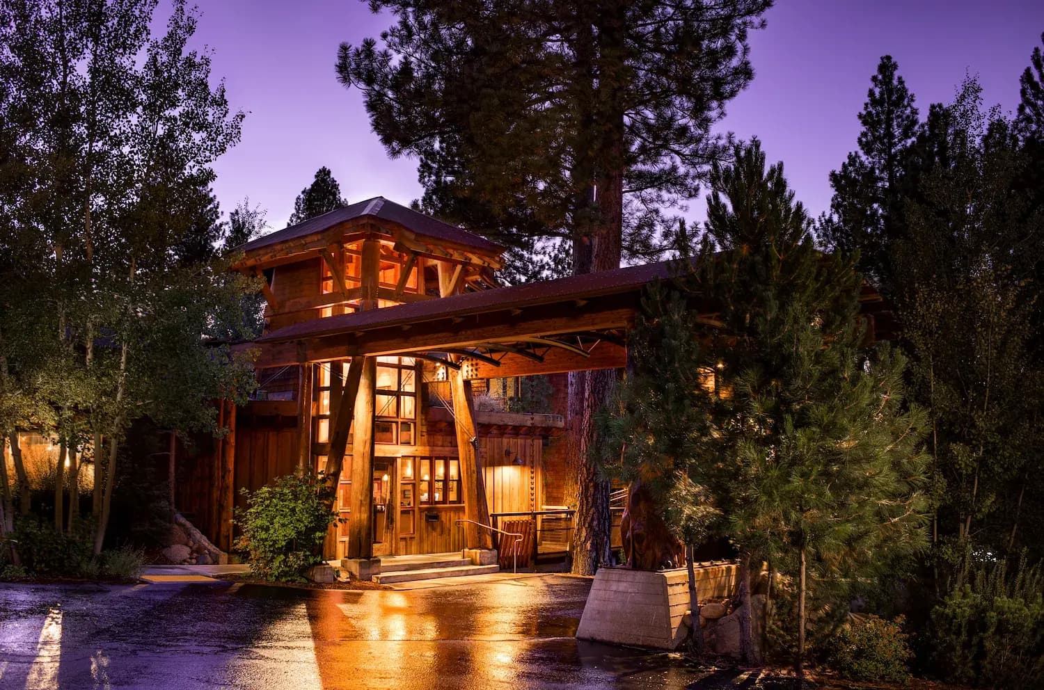 Gravity Haus Truckee-Tahoe exterior at dusk — mountain-modern lodge with warm illuminated windows in Truckee, CA Gravity Haus Truckee-Tahoe exterior at dusk — mountain-modern lodge with warm illuminated windows in Truckee, CA