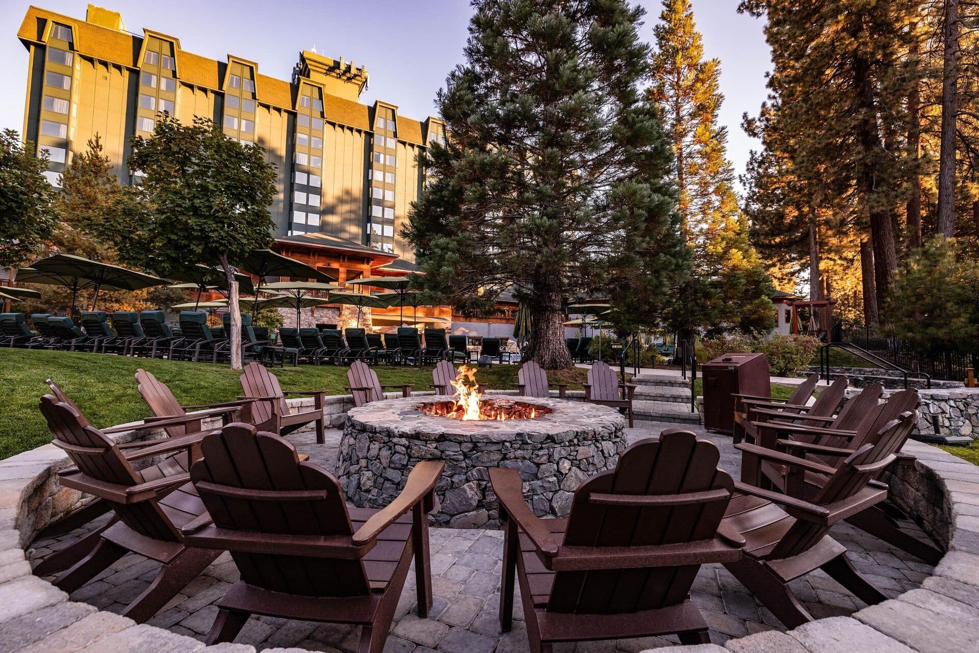 Outdoor firepit patio with adirondack chairs at Hyatt Regency Lake Tahoe
