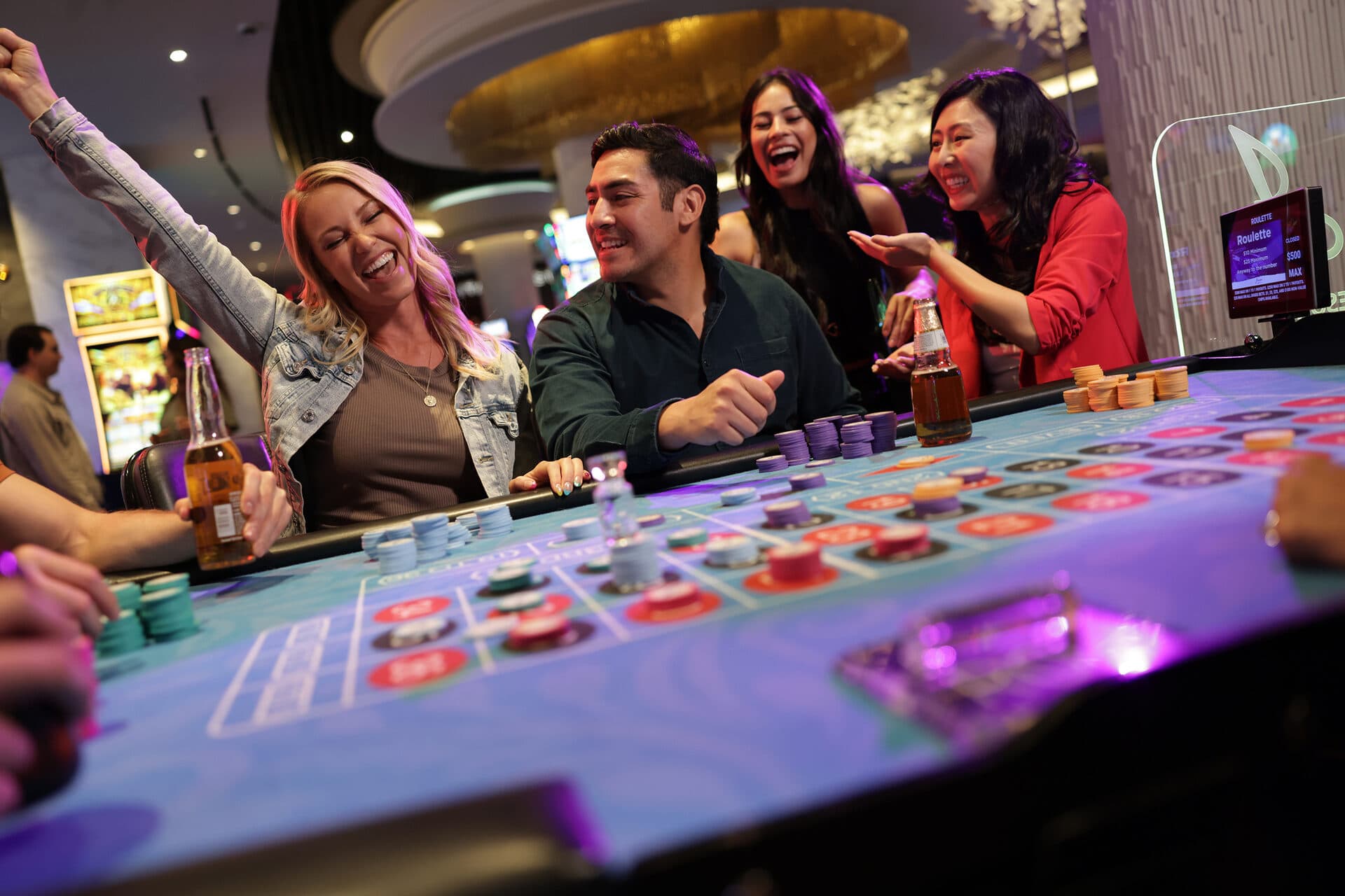 J Resort Reno lobby with guests and staff