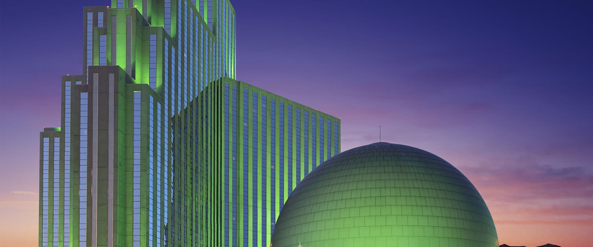 Silver Legacy Reno exterior with signature silver dome at sunset