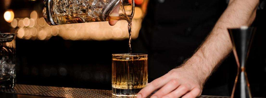 Ringside Bar at Eldorado Resort Casino – AT THE ROW — bar interior with signature dining and ambience